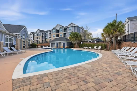 Apartment pool area with deck space