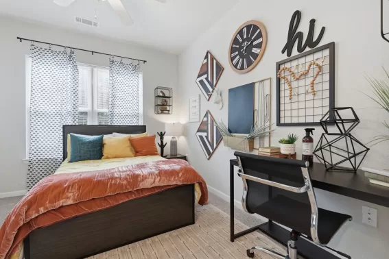 Apartment bedroom with furniture and decor